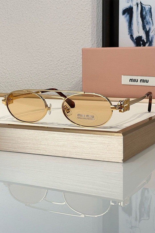 Женские солнцезащитные очки MIU MIU Oval