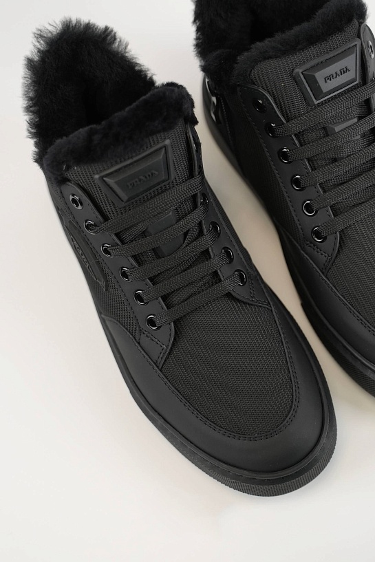 Комбинированные кроссовки с мехом Prada