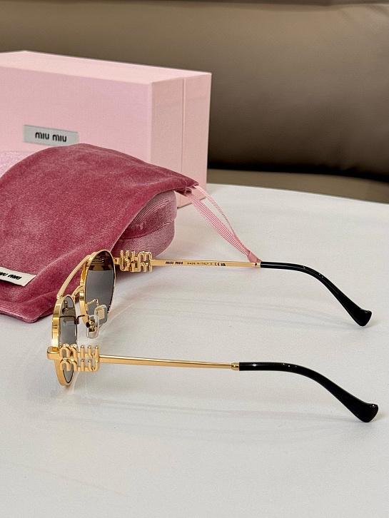 Женские солнцезащитные очки MIU MIU Oval