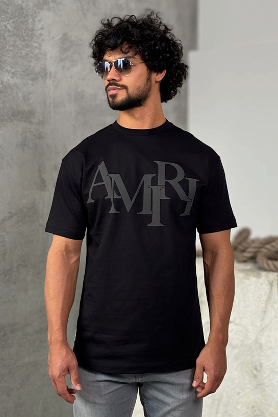 Футболка чёрного цвета Amiri staggered logo