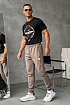 Спортивные штаны бежевого цвета Tommy Jeans logo-embroidered