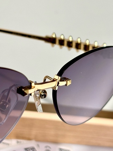 Солнцезащитные очки Cartier   
