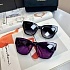 Женские сонцезащитные очки  Dolce & Gabbana фиолетового цвета