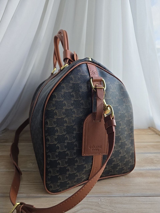 Кожаная дорожная сумка Celine Triomphe 50x26 см