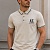 Бежевое поло Armani Exchange embroidered-logo