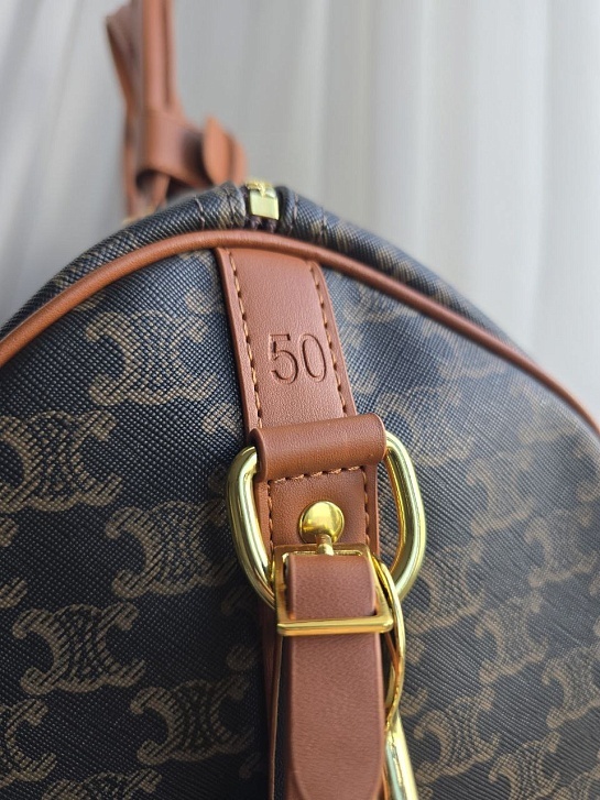 Кожаная дорожная сумка Celine Triomphe 50x26 см