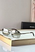 Солнцезащитные очки Prada 