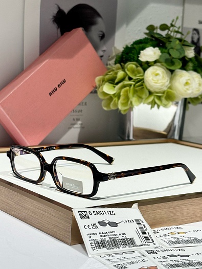 Женские очки MIU MIU с леопардовой оправой   