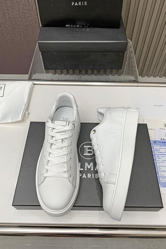 Кожаные кроссовки Balmain белого цвета