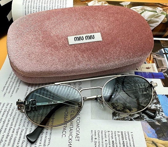 Женские солнцезащитные очки MIU MIU Oval