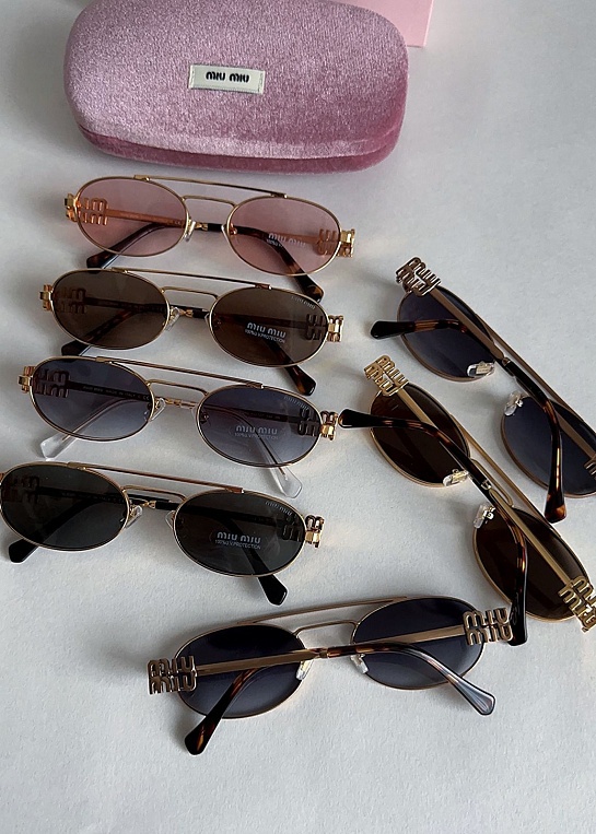 Женские солнцезащитные очки MIU MIU Oval