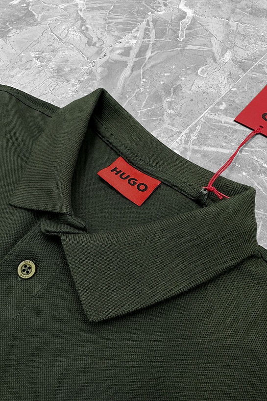 Мужское поло Hugo Boss зелёного цвета 