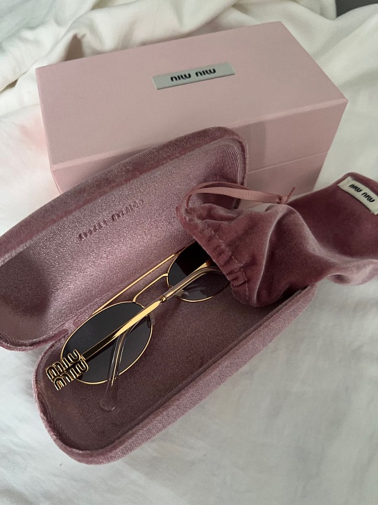 Женские солнцезащитные очки MIU MIU Oval