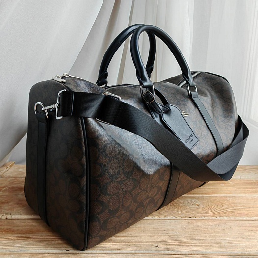 Кожаная дорожная сумка Coach monogram 50x28 см   
