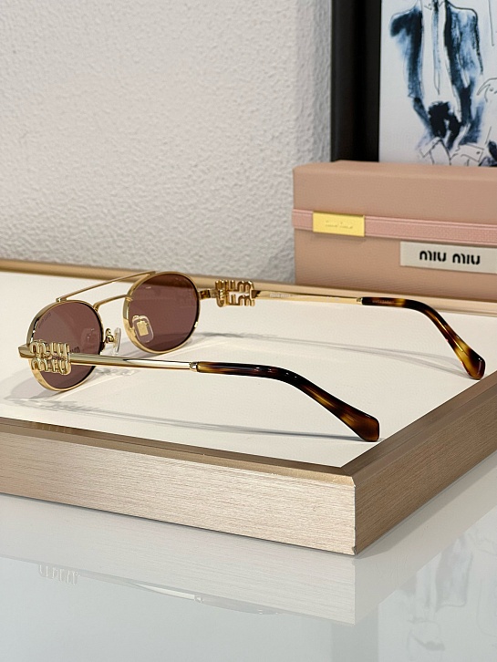Женские солнцезащитные очки MIU MIU Oval