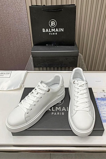Кожаные кроссовки Balmain белого цвета   