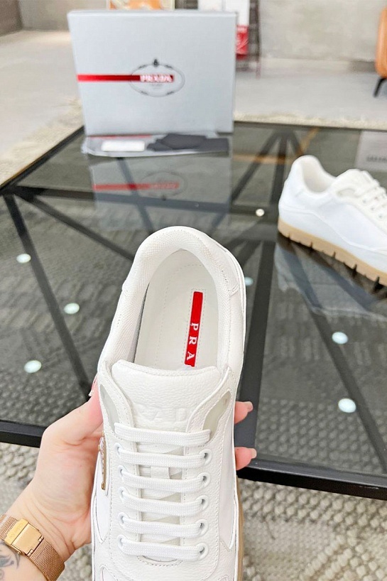 Кожаные кроссовки Prada logo-plaque - White