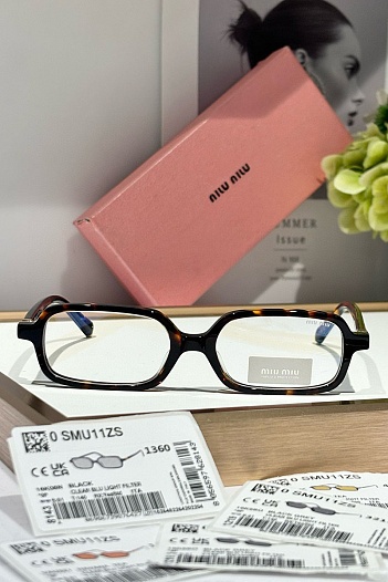 Женские очки MIU MIU с леопардовой оправой   