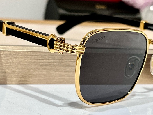 Солнцезащитные очки Cartier   