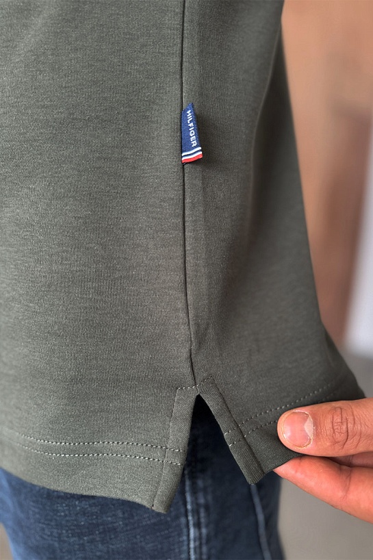 Тёмно-зелёное мужское поло Tommy Hilfiger est.1985