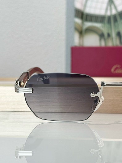 Солнцезащитные очки Cartier   