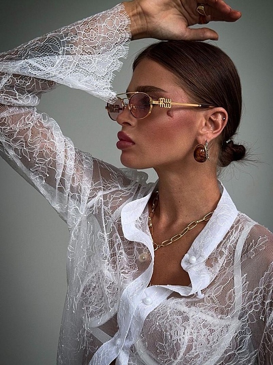 Женские солнцезащитные очки MIU MIU Oval