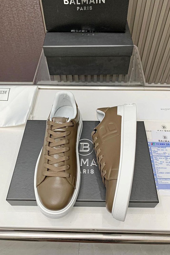Кожаные кроссовки Balmain бежевого цвета