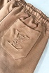 Брендовые штаны Louis Vuitton бежевого цвета