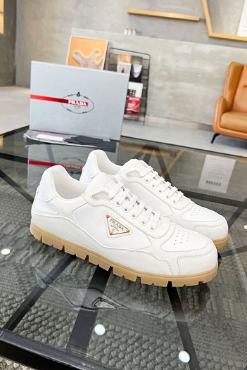 Кожаные кроссовки Prada logo-plaque - White   