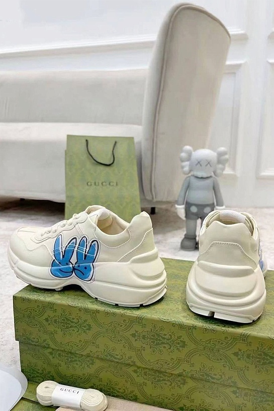 Женские кожаные кроссовки Gucci Rhyton