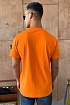 Оранжевая мужская футболка с патчем на плече Stone Island