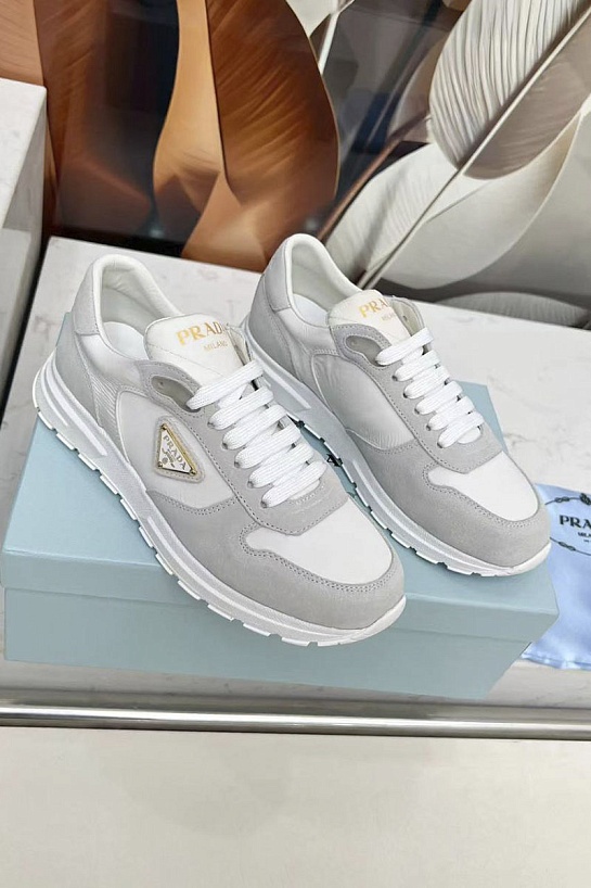 Женские комбинированные кроссовки Prada