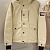 Бежевый пуховик Burberry London England logo-patch