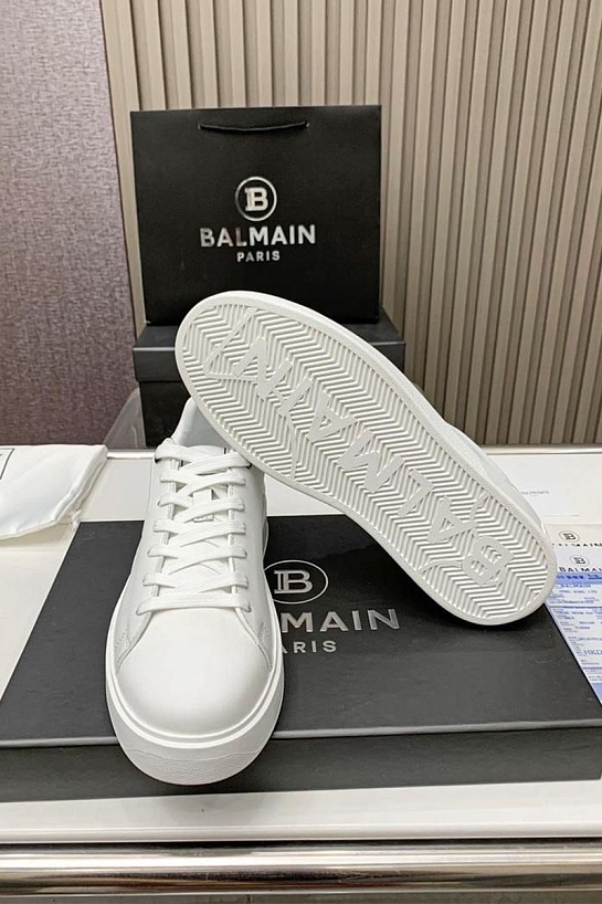 Кожаные кроссовки Balmain белого цвета