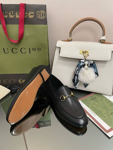 Женские кожаные лоферы Gucci чёрного цвета   