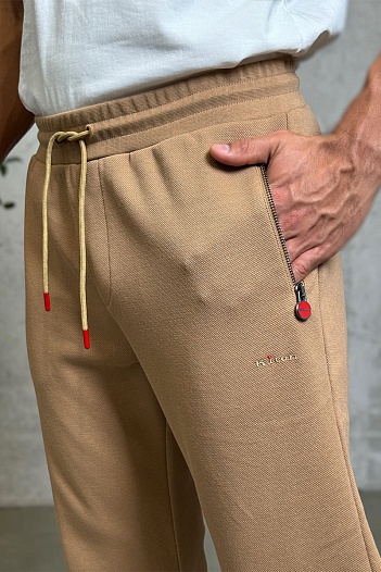 Спортивные штаны Kiton бежевого цвета   
