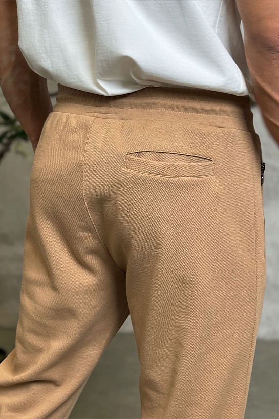 Спортивные штаны Kiton бежевого цвета