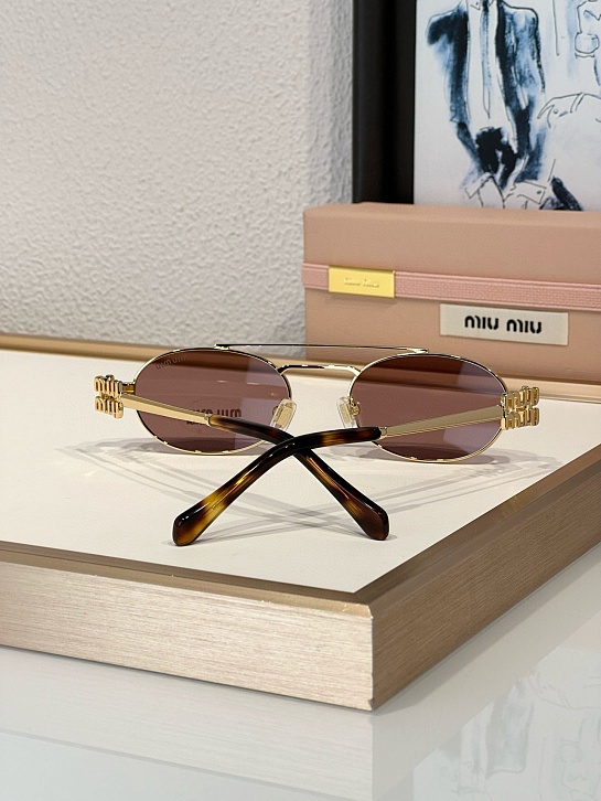Женские солнцезащитные очки MIU MIU Oval