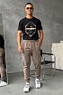 Спортивные штаны бежевого цвета Tommy Jeans logo-embroidered