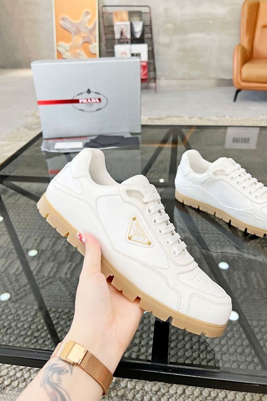 Кожаные кроссовки Prada logo-plaque - White