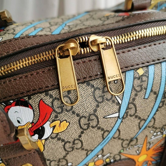 Дорожная кожаная сумка Gucci Disney GG Supreme 45x28 см