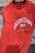Оранжевая оверсайз футболка Balenciaga с рваной отделкой