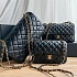 Кожаная чёрная сумка Chanel 25x15 см