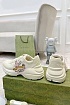 Женские кожаные кроссовки Gucci Rhyton