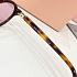 Солнцезащитные очки MIU MIU с леопардовой оправой