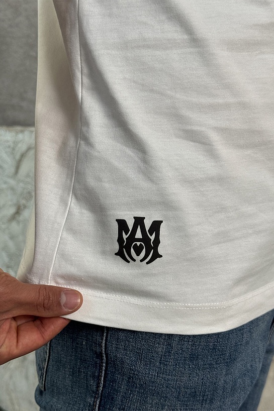 Футболка белого цвета Amiri staggered logo