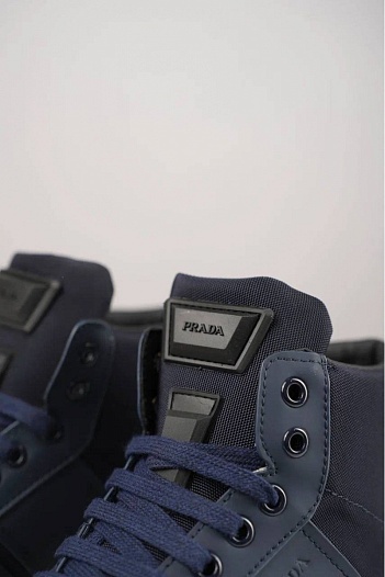 Комбинированные кроссовки с мехом Prada   