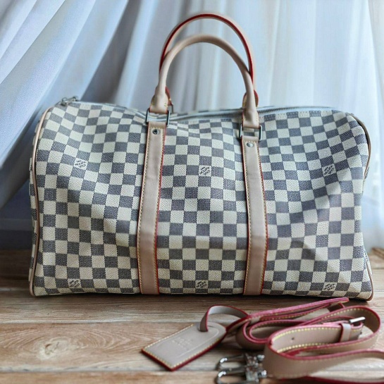 Кожаная дорожная сумка Louis Vuitton KeepAll 55x27 см