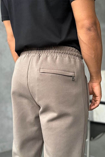 Спортивные штаны бежевого цвета Tommy Jeans logo-embroidered   