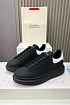 Кожаные кроссовки Alexander McQueen чёрного цвета